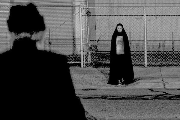 A girl walks home alone at night