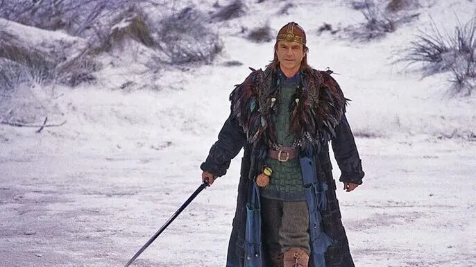 Sam Neill como Merlín